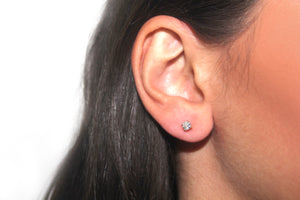 DIAMOND claw set stud earrings